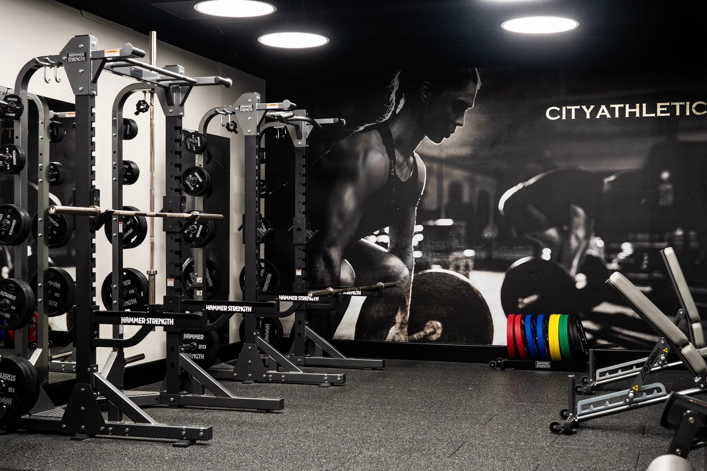Power racks and lifting floor at the Westminster gym